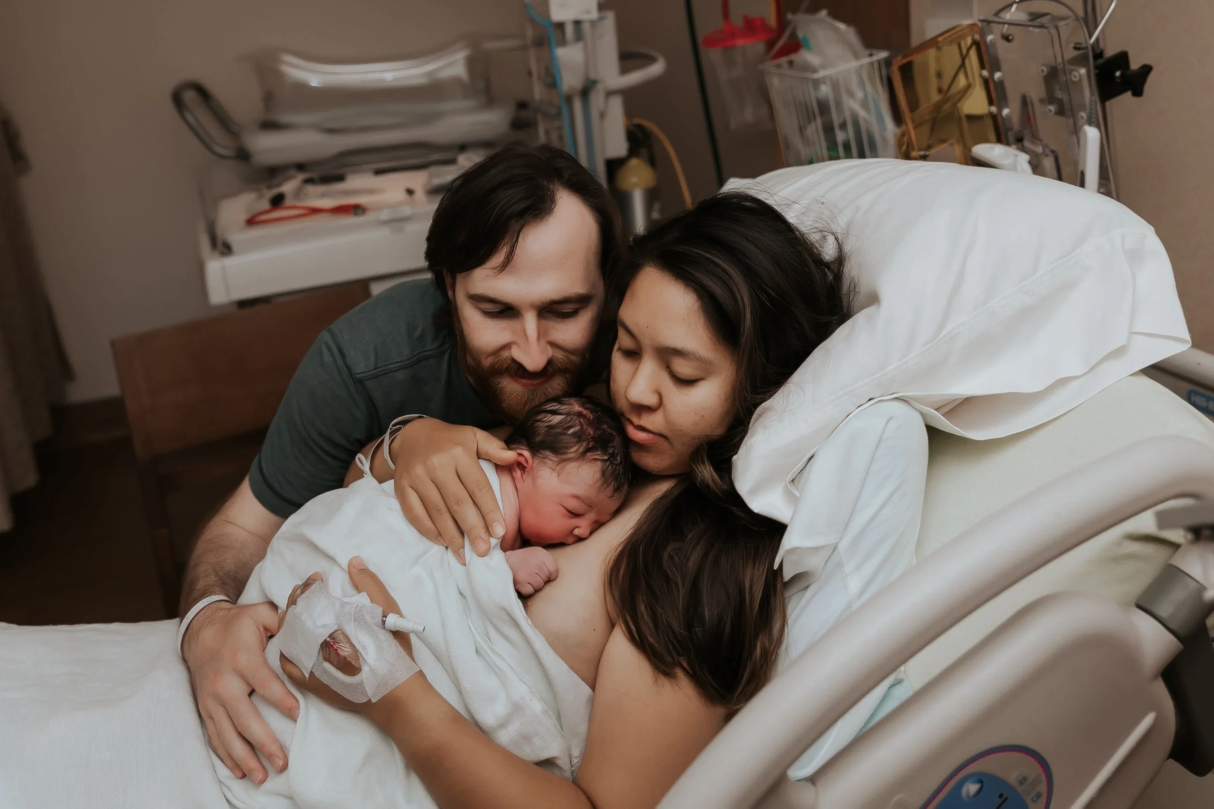 Mom, dad, and baby at El Camino Los Gatos. Photo taken by Bay Area Birth Photographer, Paige Driscoll.