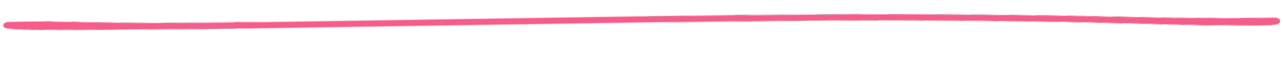 Close-up view of a pink pencil with a black eraser at the top.