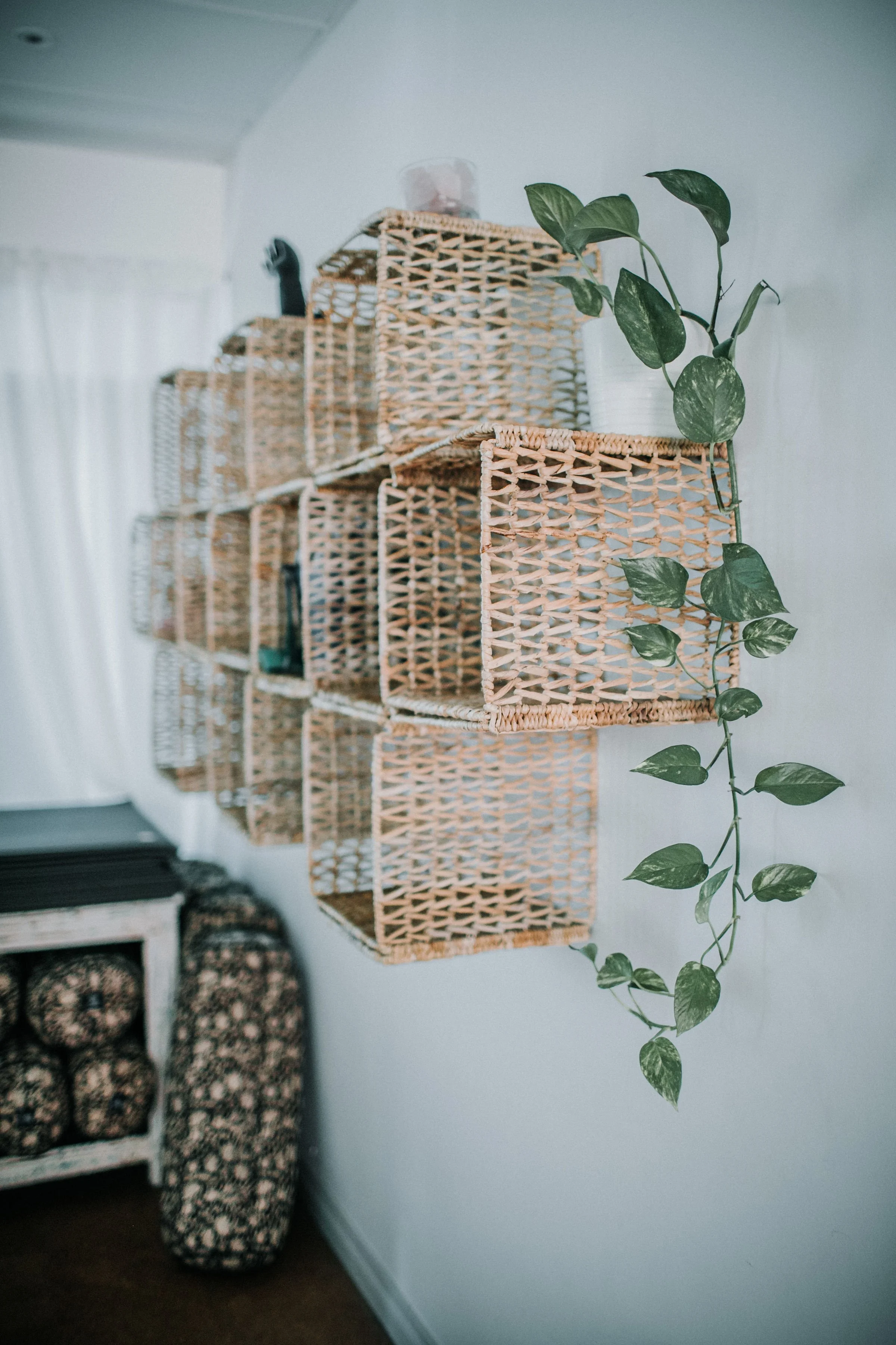 woven baskets on the wall of a light bright perth yoga studio