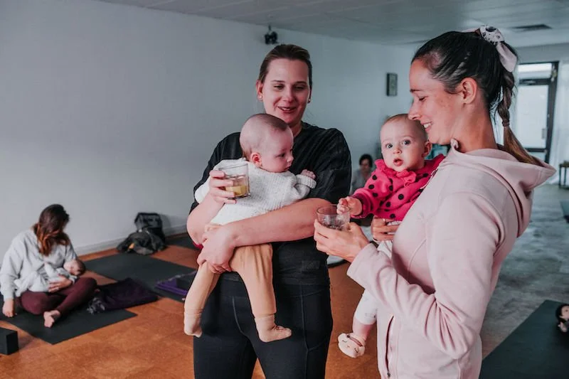 New mums connecting after mum and baby yoga class at Bloom Yoga Kingsley Perth, supportive community space