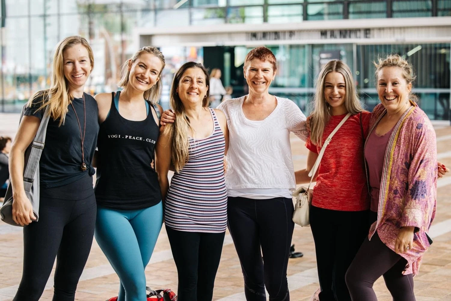Bloom Yoga Teacher Trainees practicing together at the WA Museum