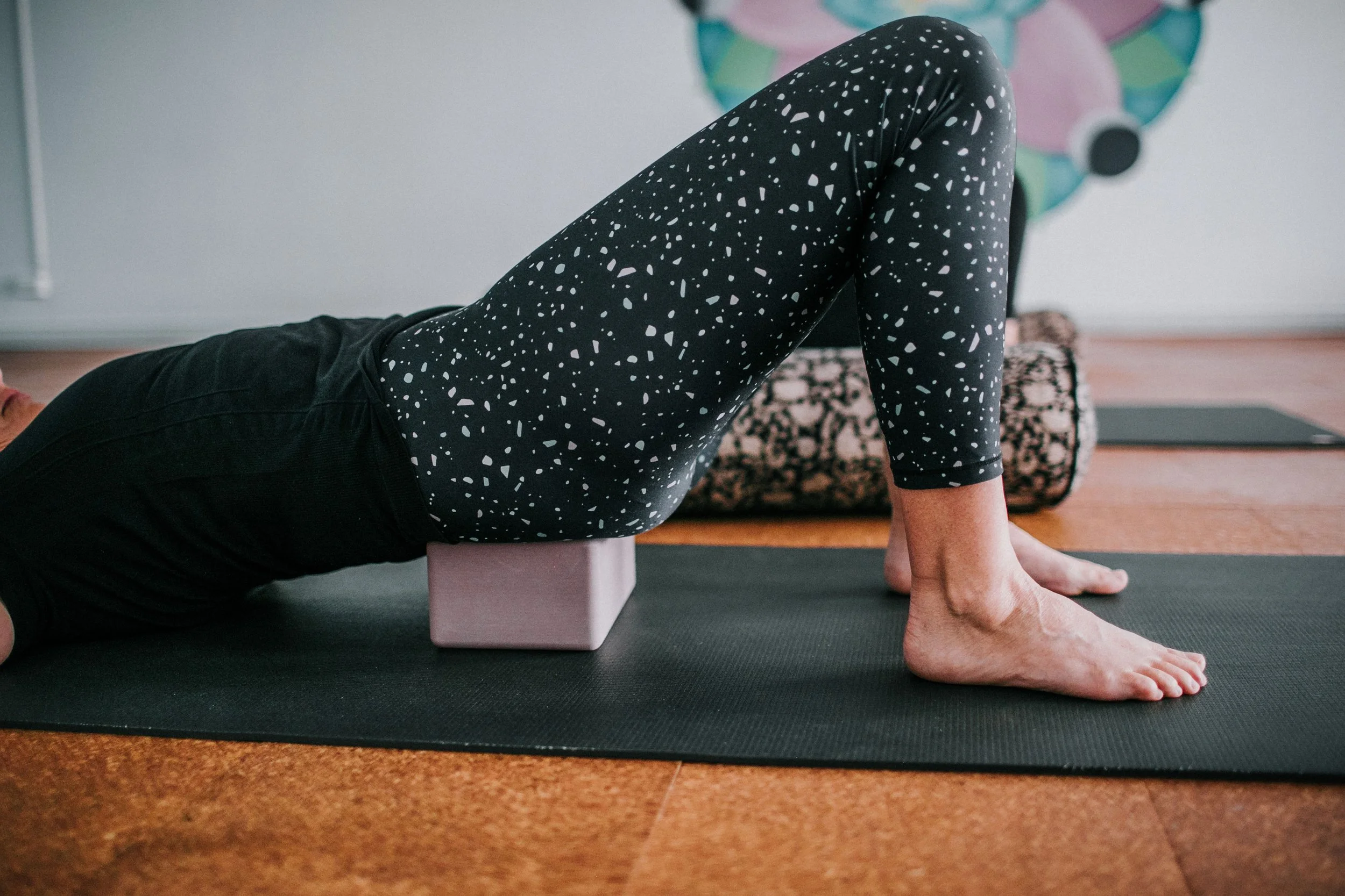 Small group women’s yoga session focused on relaxation and nervous system support in Kingsley Perth