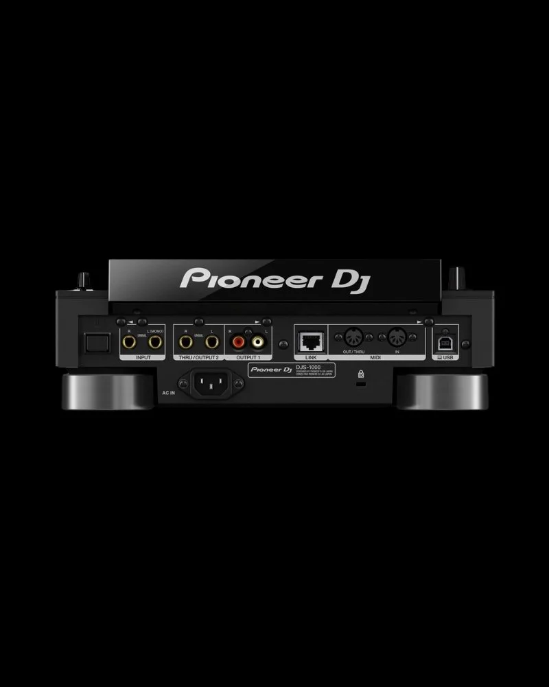 Rear view of Pioneer DJS-1000 showing audio and power connections for setup