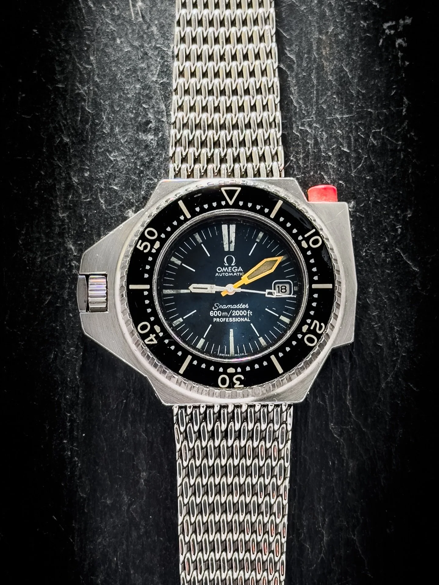 Built for Depth 🌊 Worn for Life 🤙

Here&rsquo;s Neil&rsquo;s 1977 Omega Ploprof. An icon of over-engineering and purpose-built design. Still running strong nearly 50 years later, this one wears its history proudly. 

Every scar tells a story; every