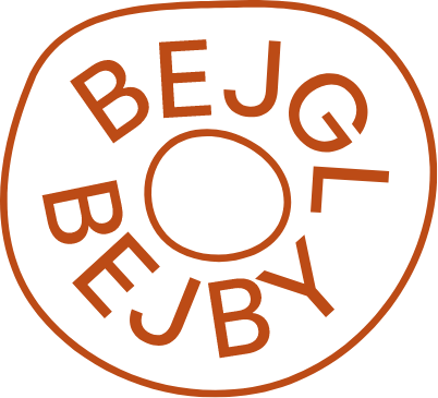 Circular logo with the words 'BE JUICY' repeated twice in a ring.
