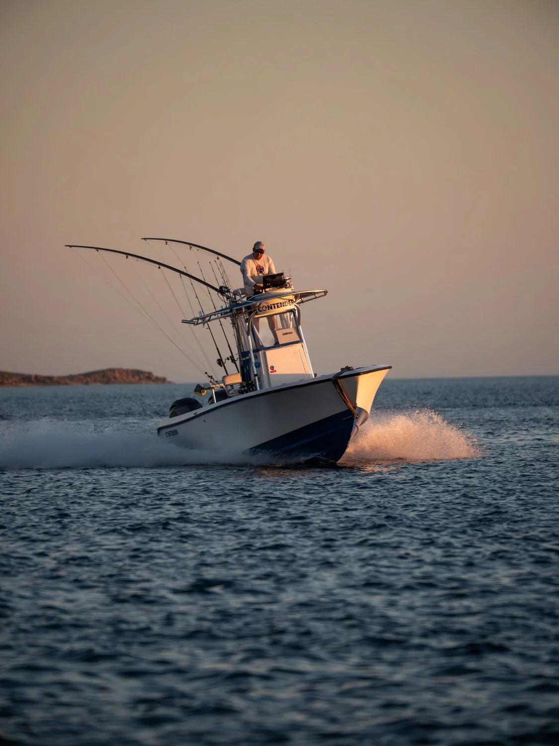 Contender 25 Centre Console running back to base at sunset in the Monte Bello Islands