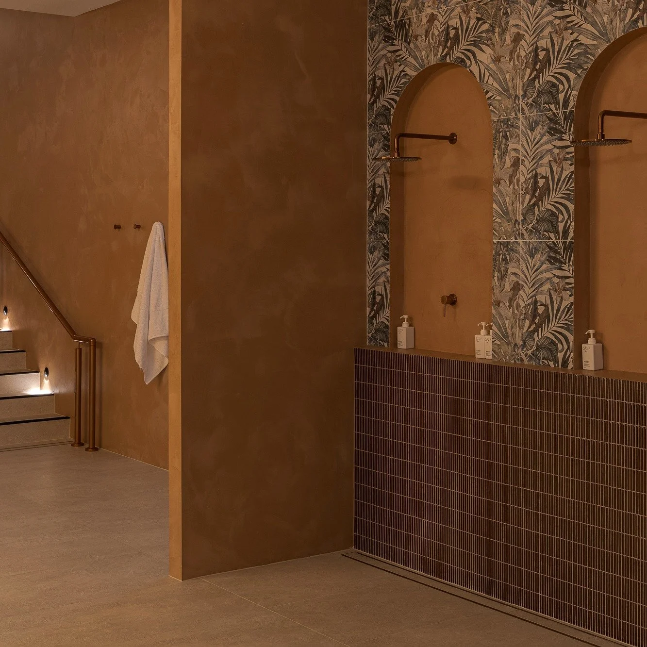 The communal showers sit at the heart of the Haven experience, creating a moment to rinse, reset and move between each ritual.

Soft curves, warm tones and natural textures make even the simplest moments feel considered.