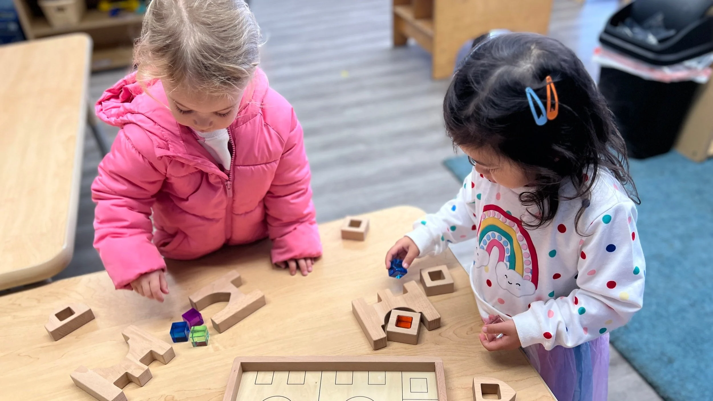 Two children learning and playing together