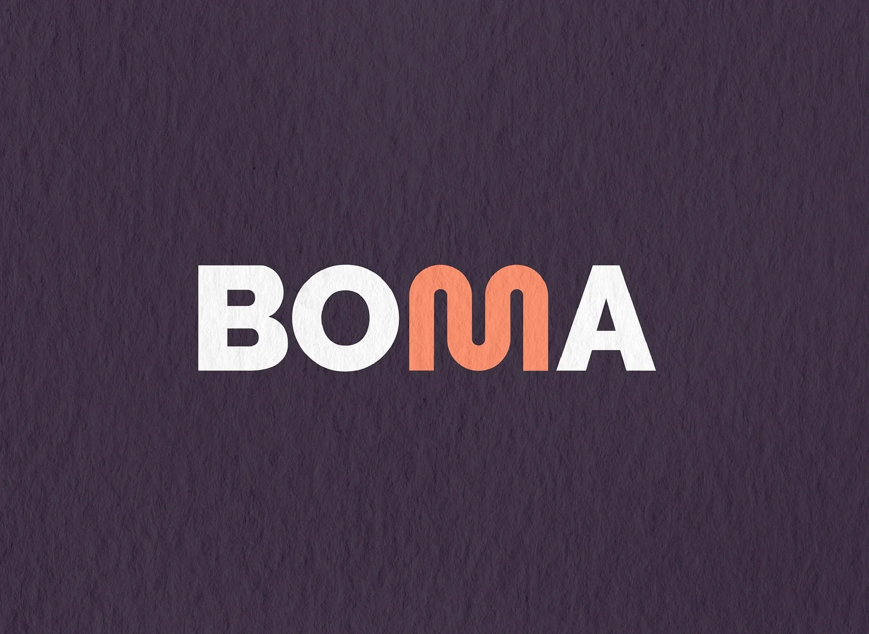 Stylized text spelling BOMA with the second 'O' in pink color on a purple textured background.