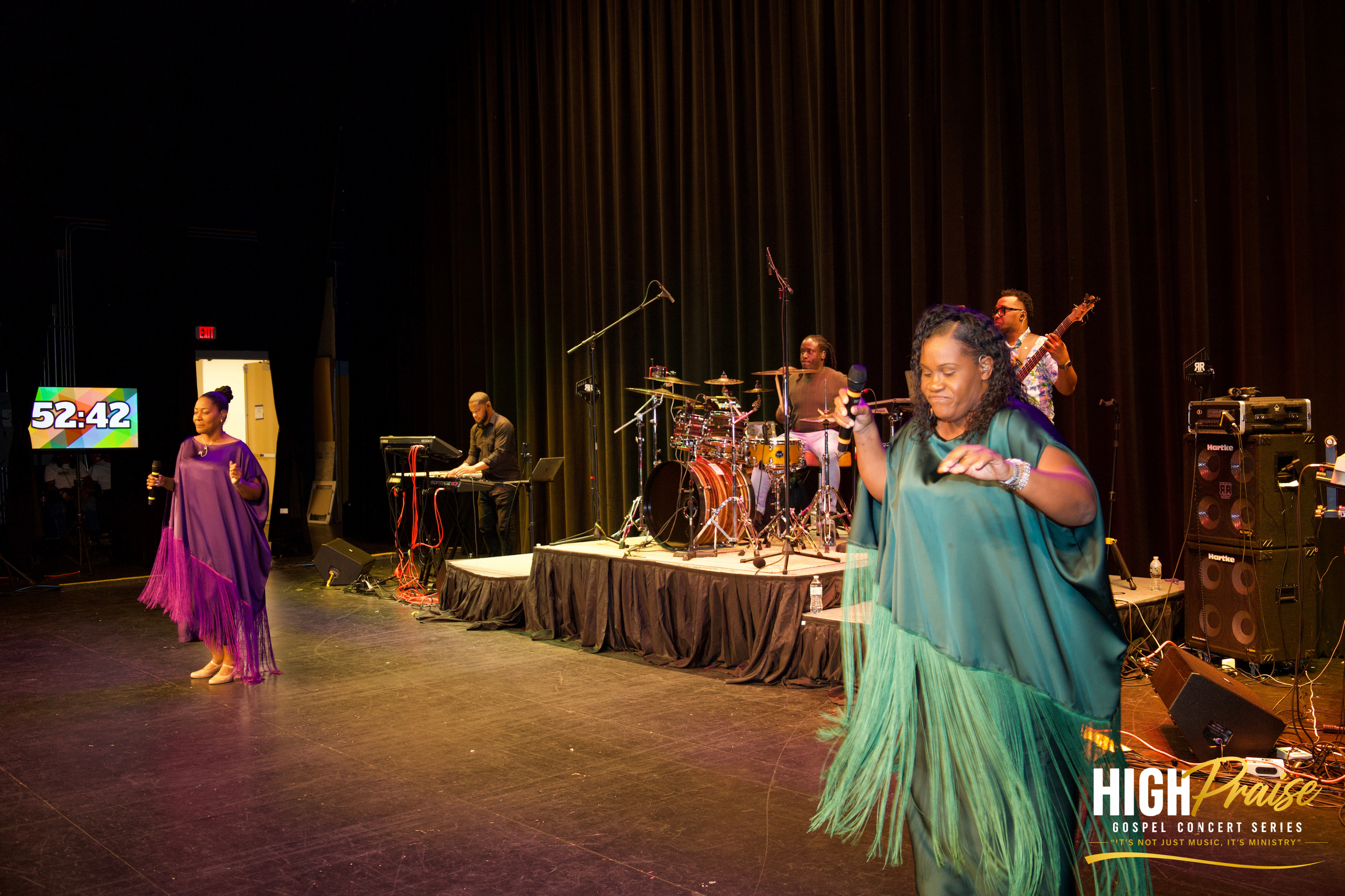 High Priase  gospel concert series  performance with singers and musicians on stage.