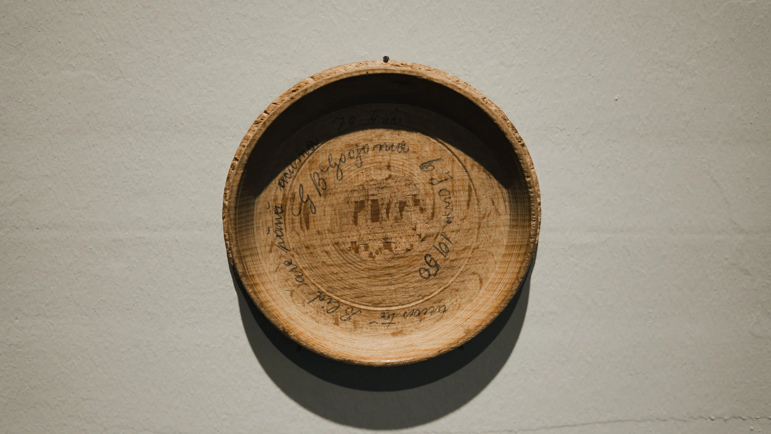 Glimpse in time,  ready-made installation, wooden bowl with a lid   made by the artist’s great-grandfather by Andrada Lolu. Photo by Daniel Truța.