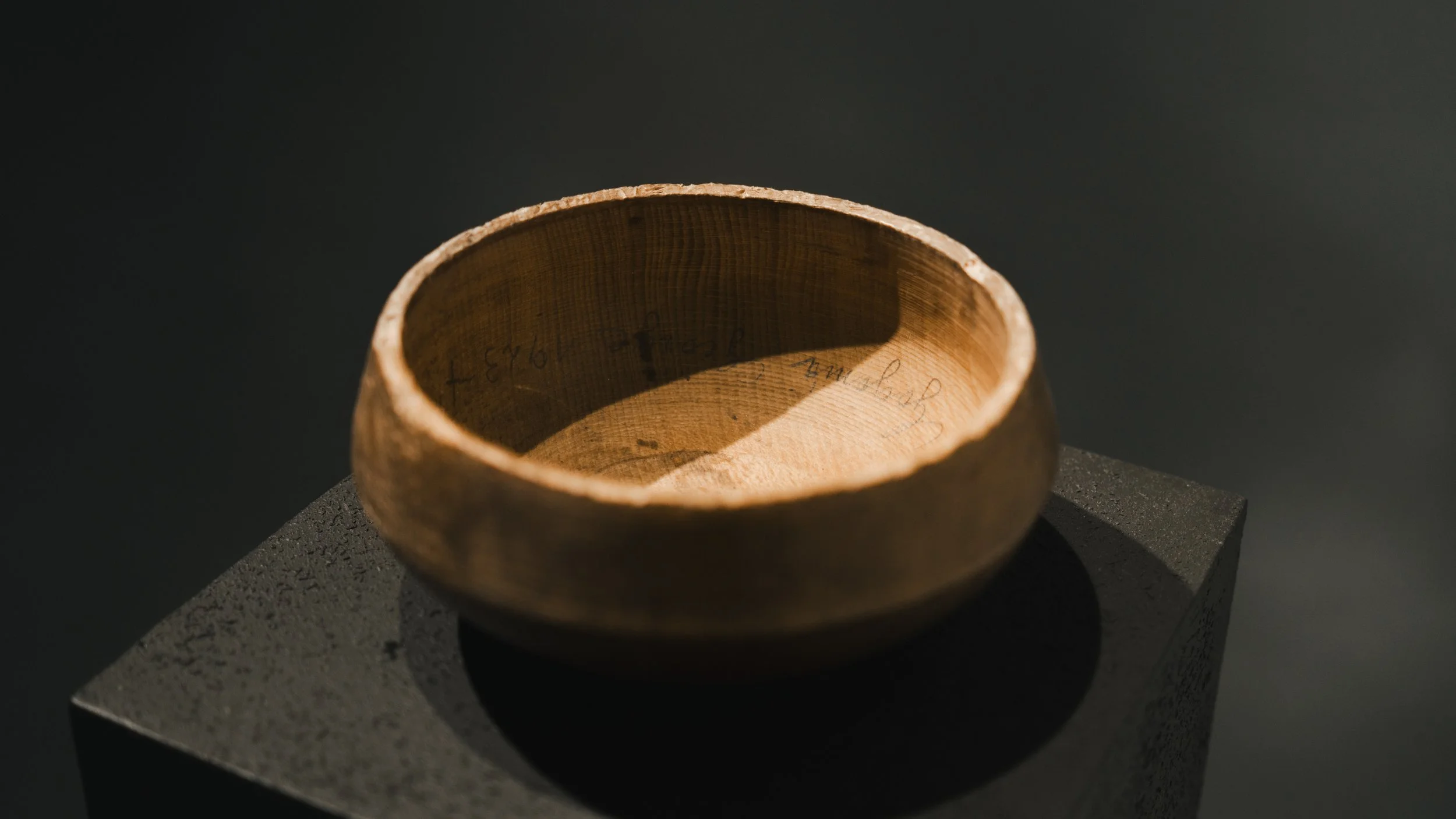 Glimpse in time,  ready-made installation, wooden bowl with a lid   made by the artist’s great-grandfather by Andrada Lolu. Photo by Daniel Truța.