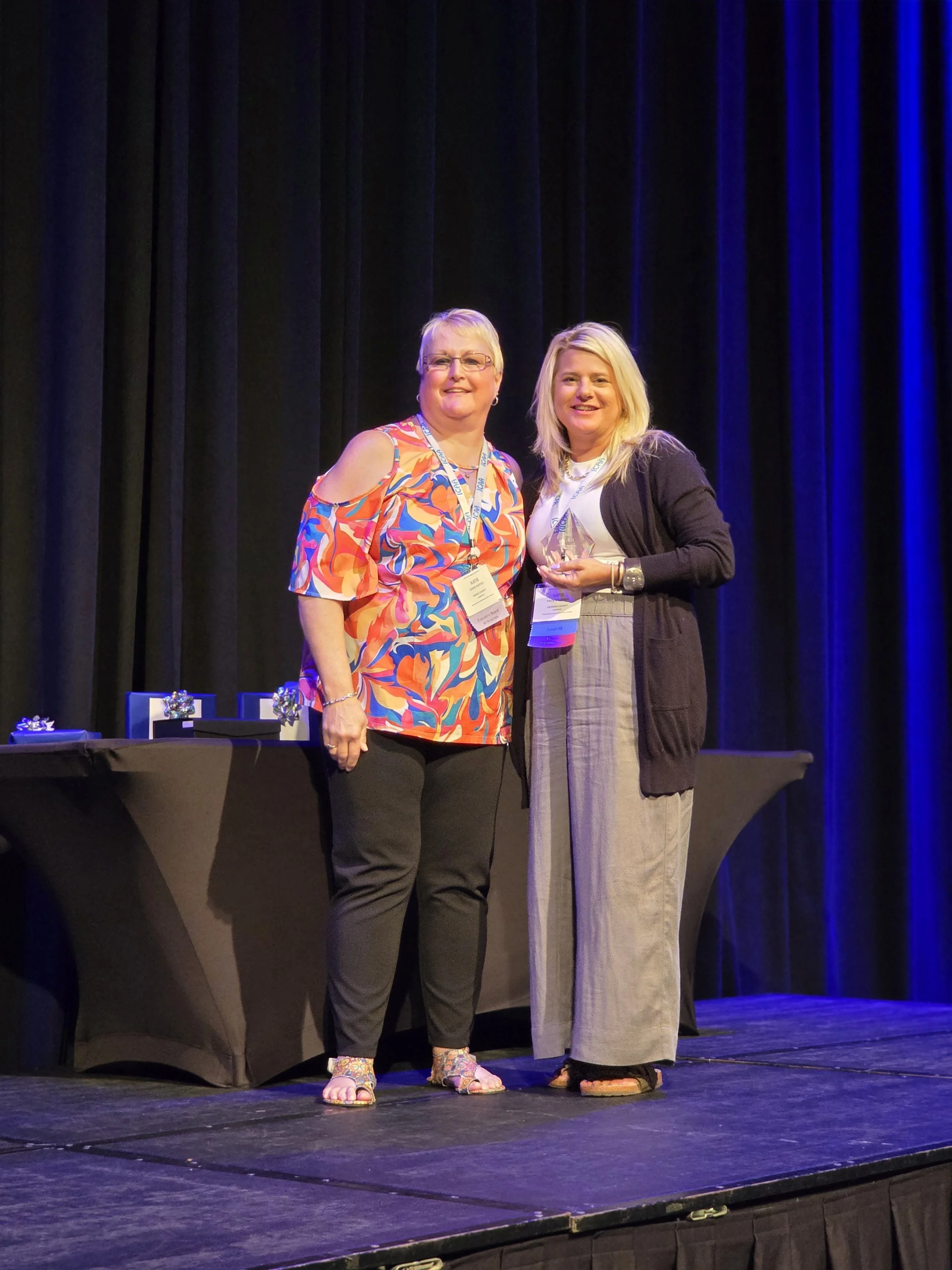 Katie Kaufman, SE District- receiving her award from ICAA EBOD Secretary, Katie Potter