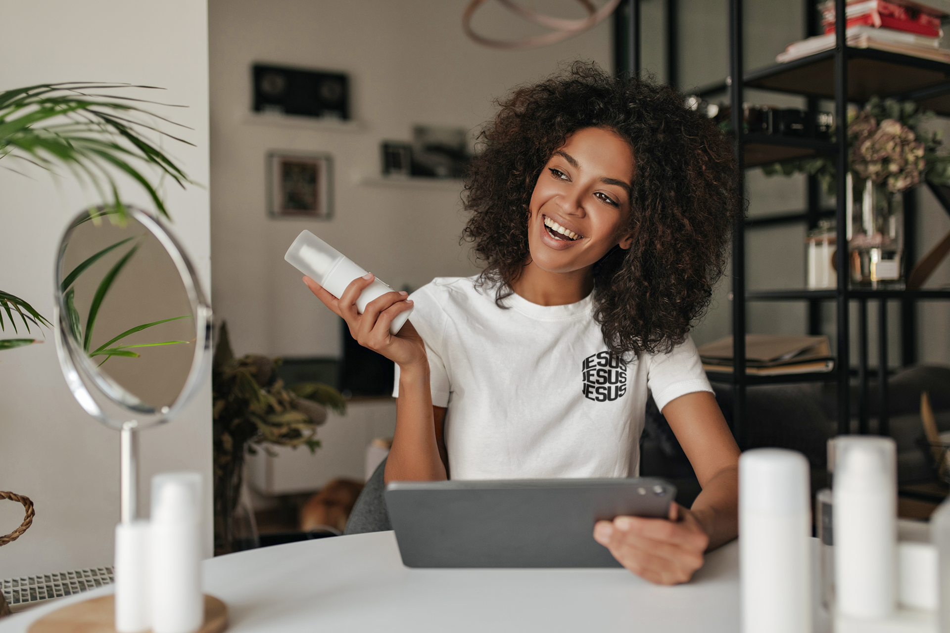 t-shirt-mockup-featuring-a-happy-woman-holding-a-skincare-product-m11883-r-el2.png