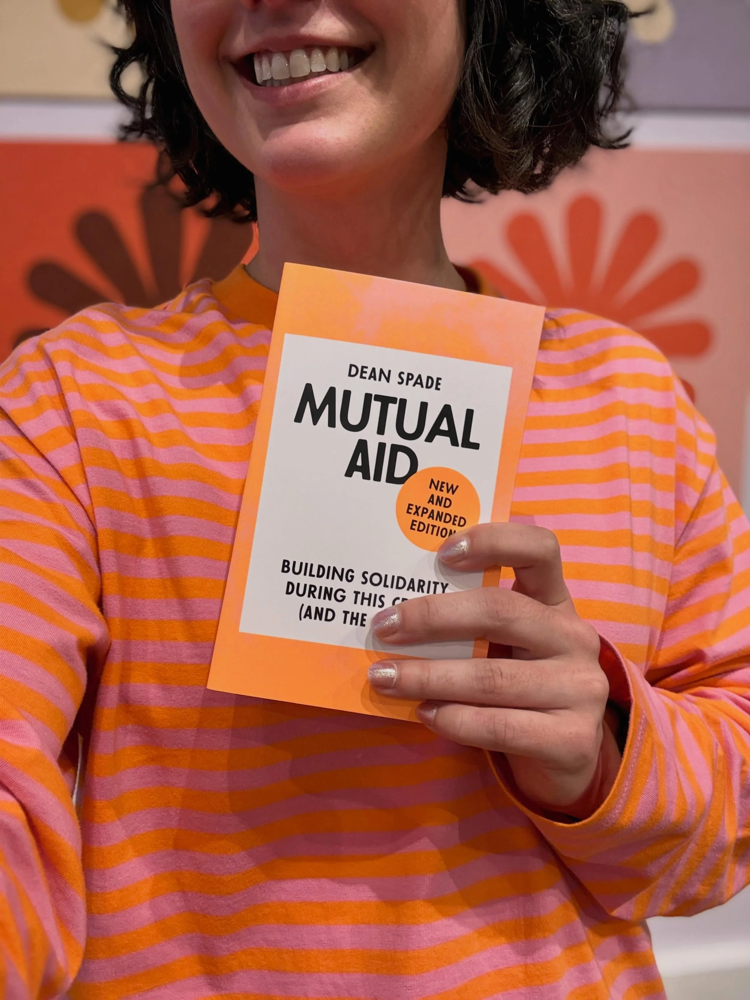 We totallyyy didn&rsquo;t plan this matching-outfit-moment 🧡✨ Grab a copy of @spade.dean&rsquo;s New &amp; Expanded Edition of Mutual Aid at Box Turtle Books today!