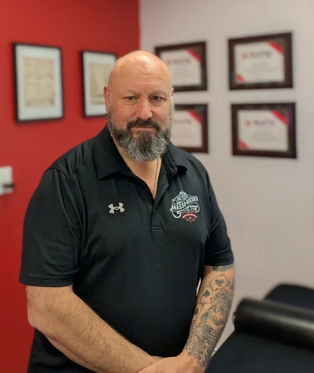 Dean Constantini, award-winning Neuromuscular Performance Specialist and author of Beyond Pain.