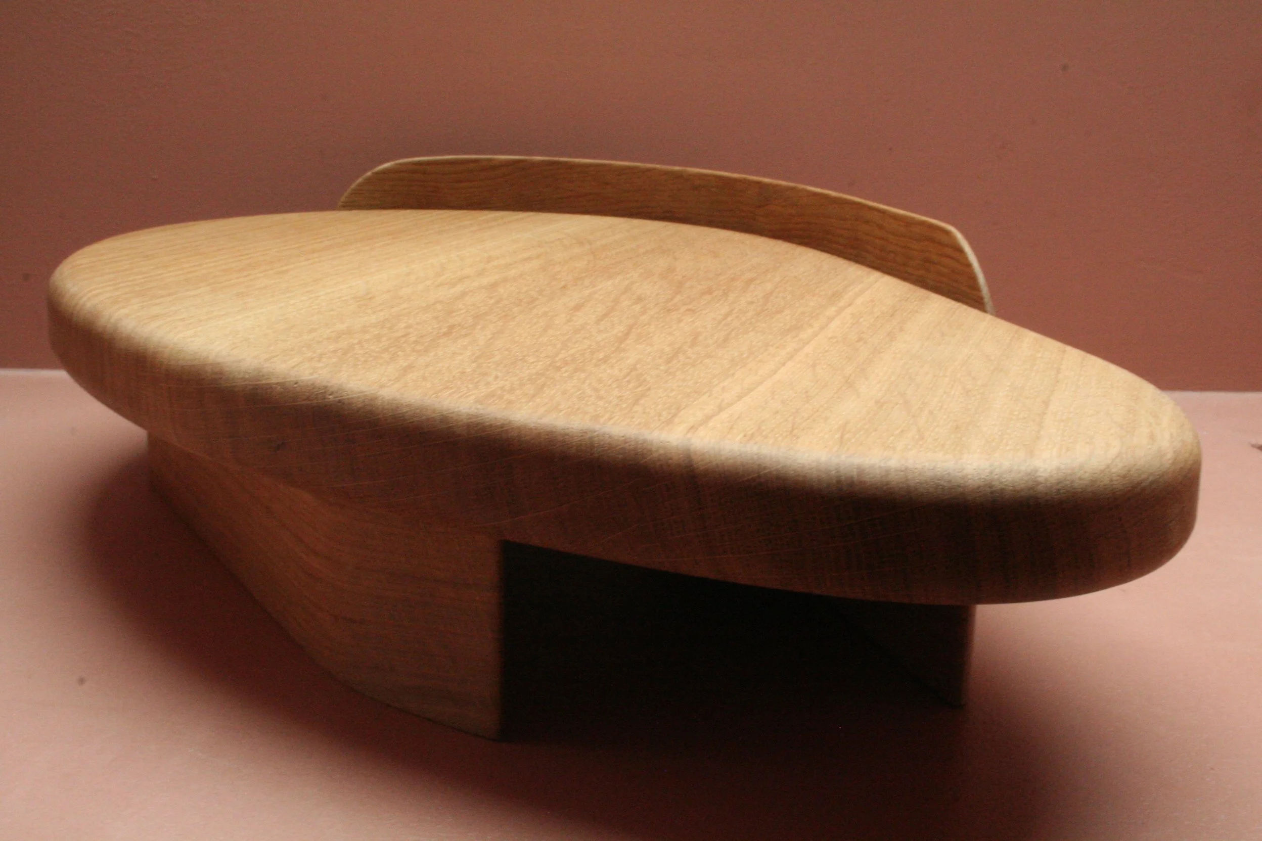 Houten miniatuurmodel in de vorm van een boot.