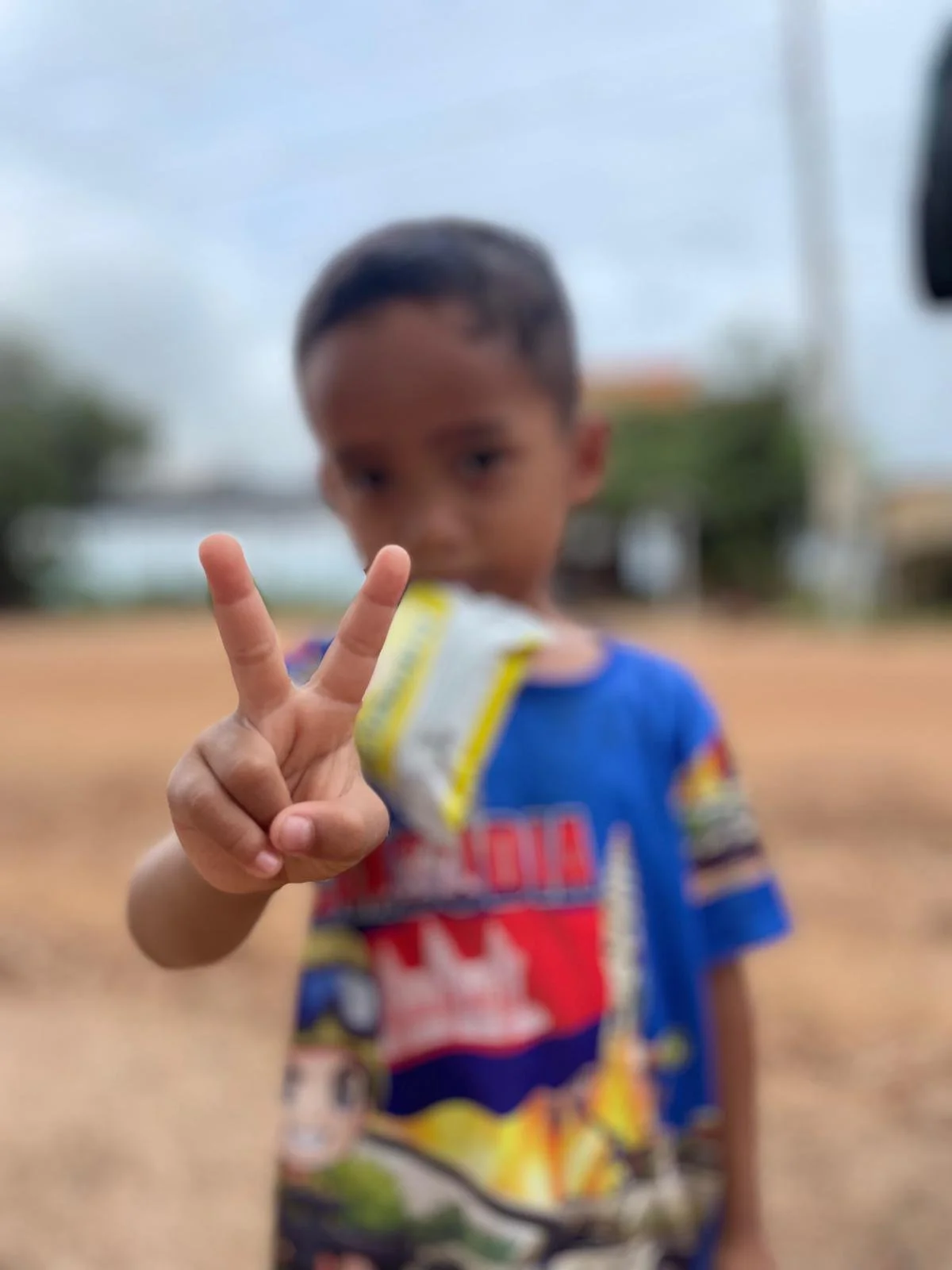 Boy with Peace Sign.