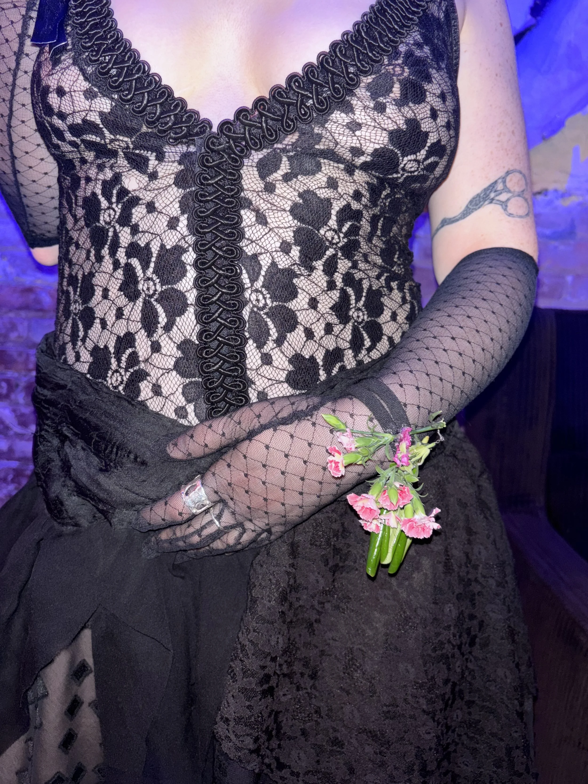 Eliza in their custom dress made from lace and other fabric scraps, vintage trim, and Japanese silk / Designed and sewn by Eliza / May 2026