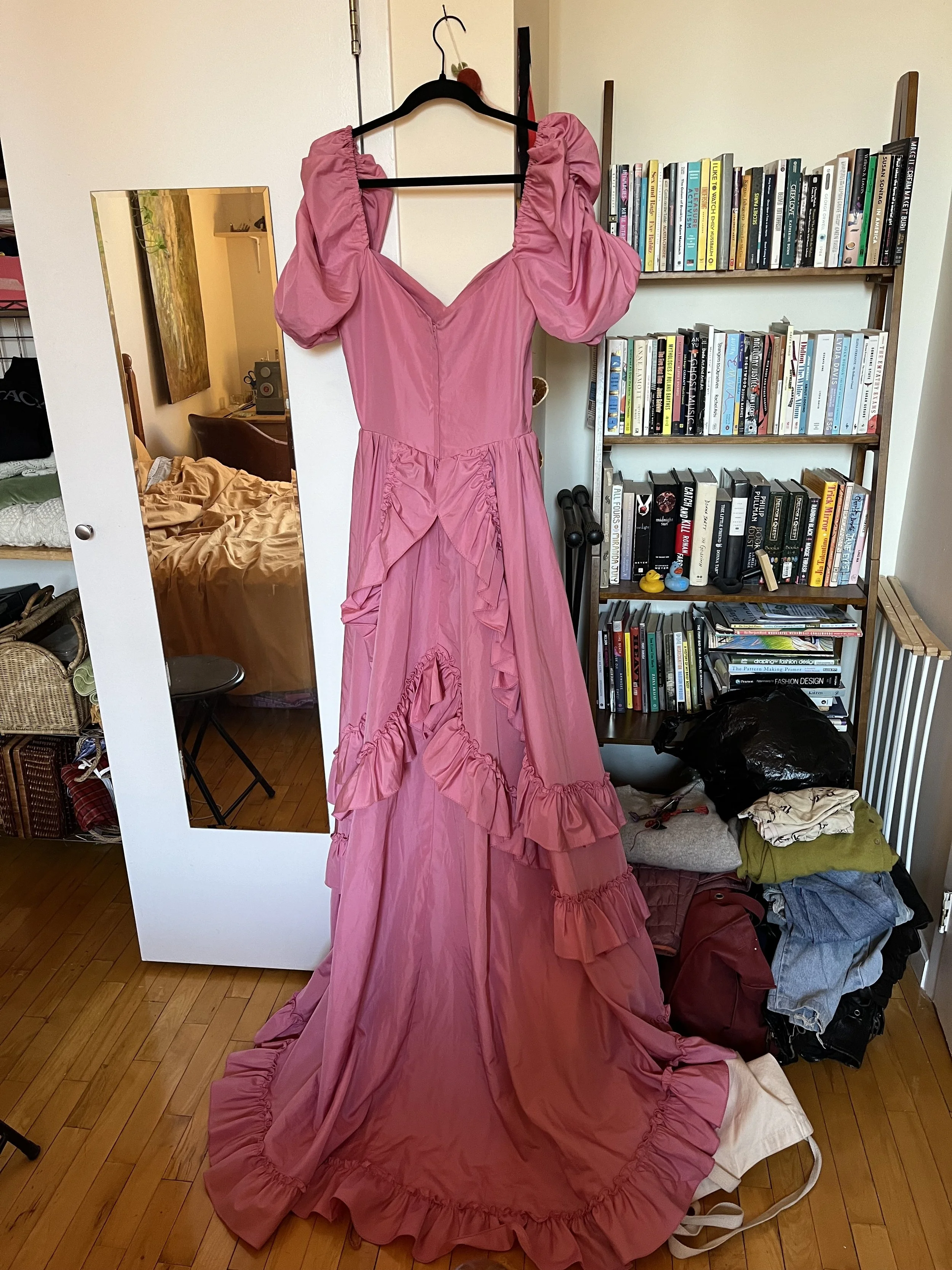 Client's gown was too small in the back and would not zip all the way up