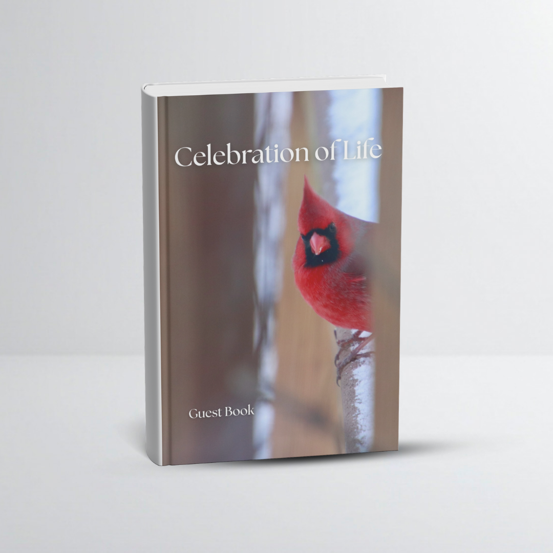 Guest book titled "Celebration of Life" with a cover photo of a red cardinal bird perched on a branch.