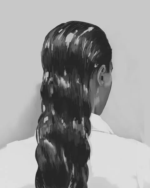 Back view of a woman with long, shiny black hair styled in a braid.