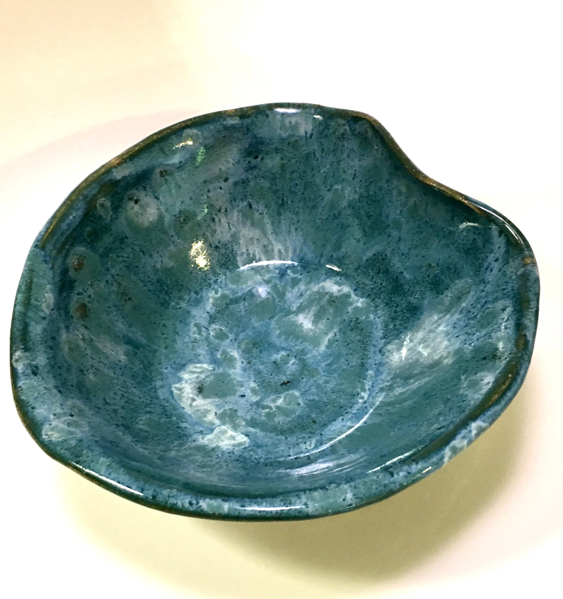 Ceramic dish in varying shades of blue