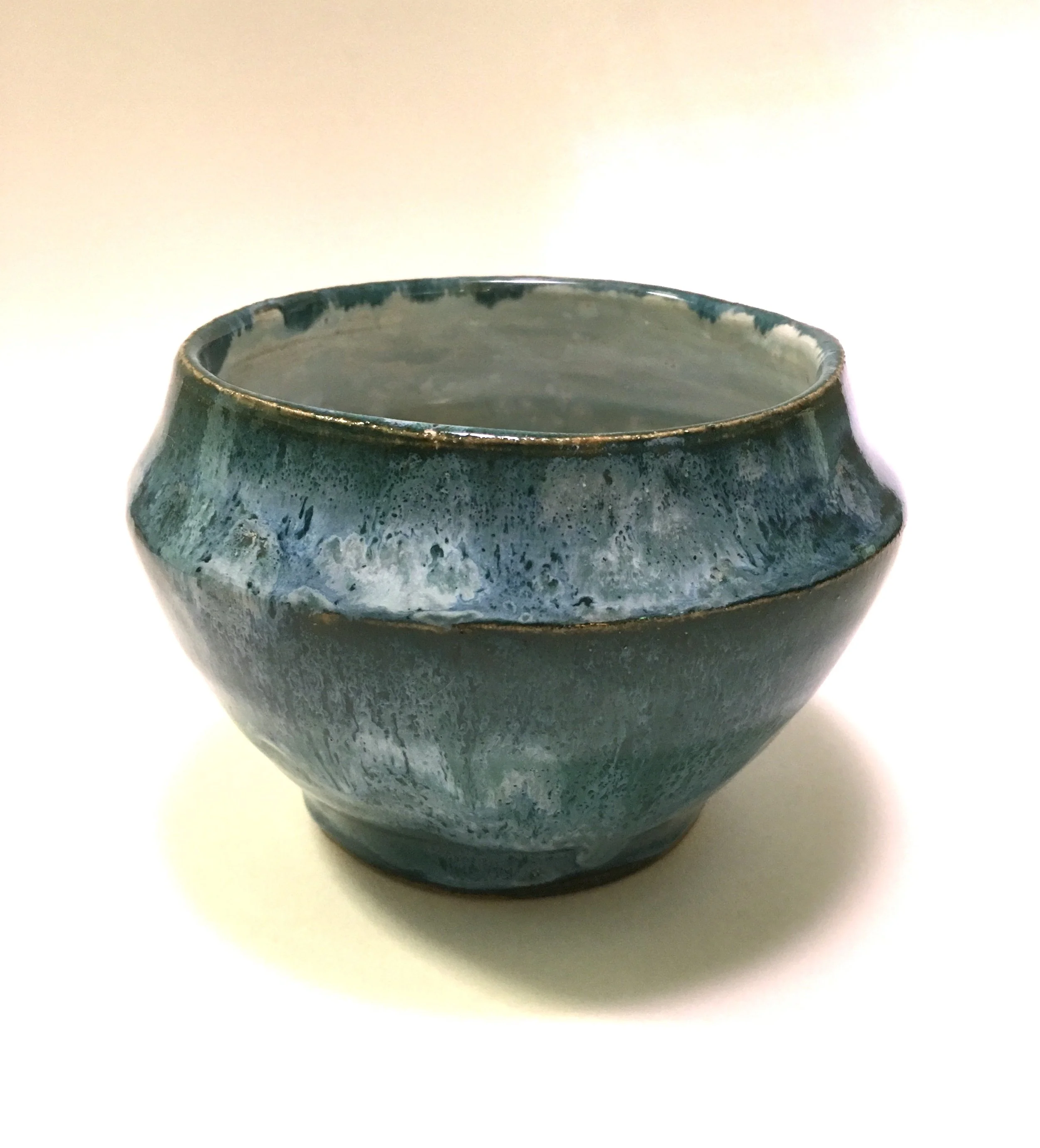 Ceramic vase in varying shades of blue