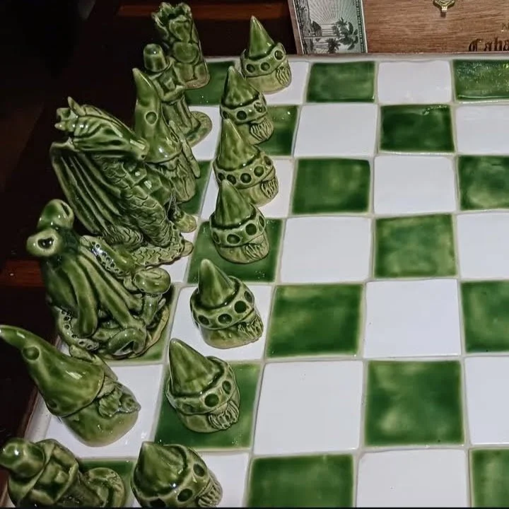 Green and white ceramic chess set
