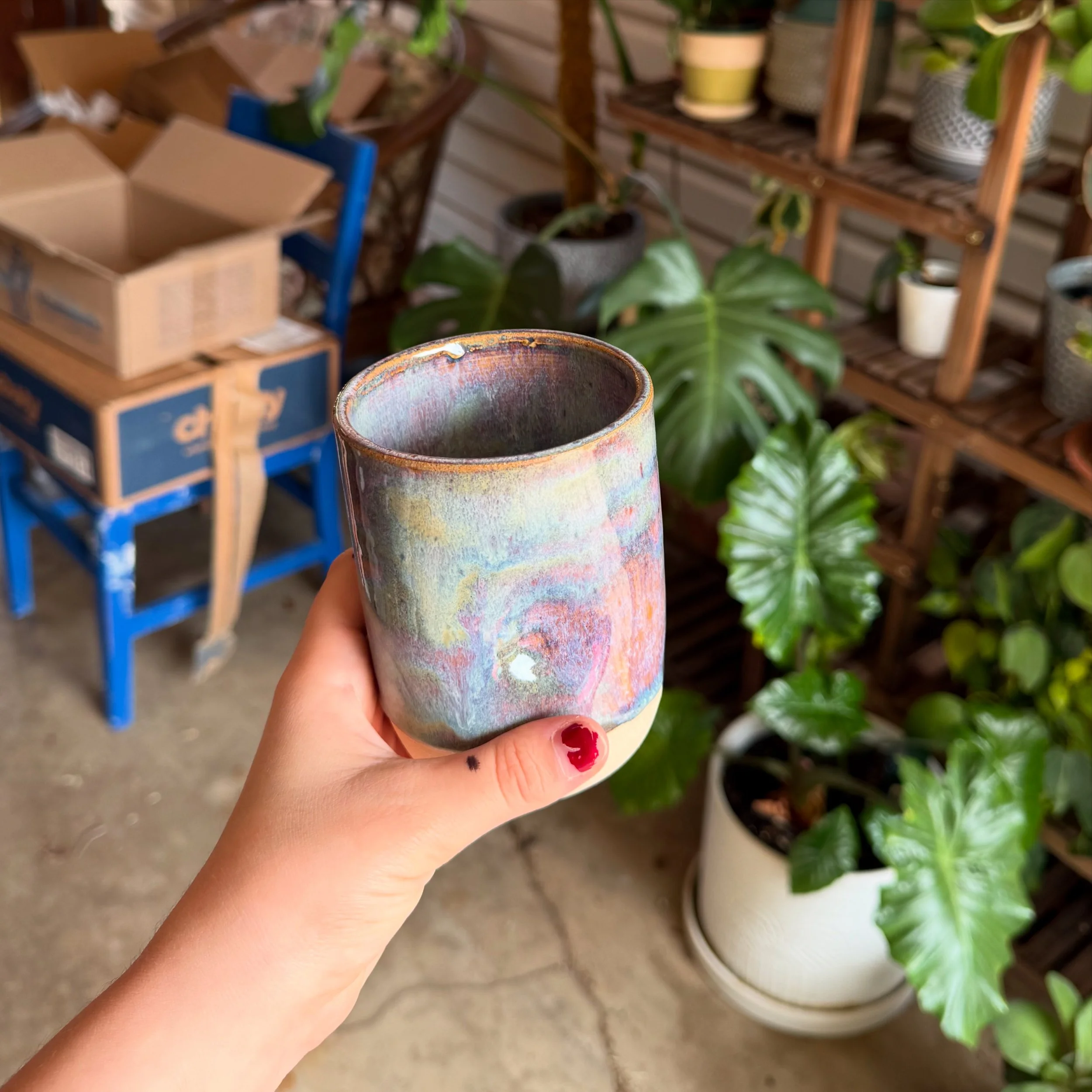 Multi-colored ceramic cup