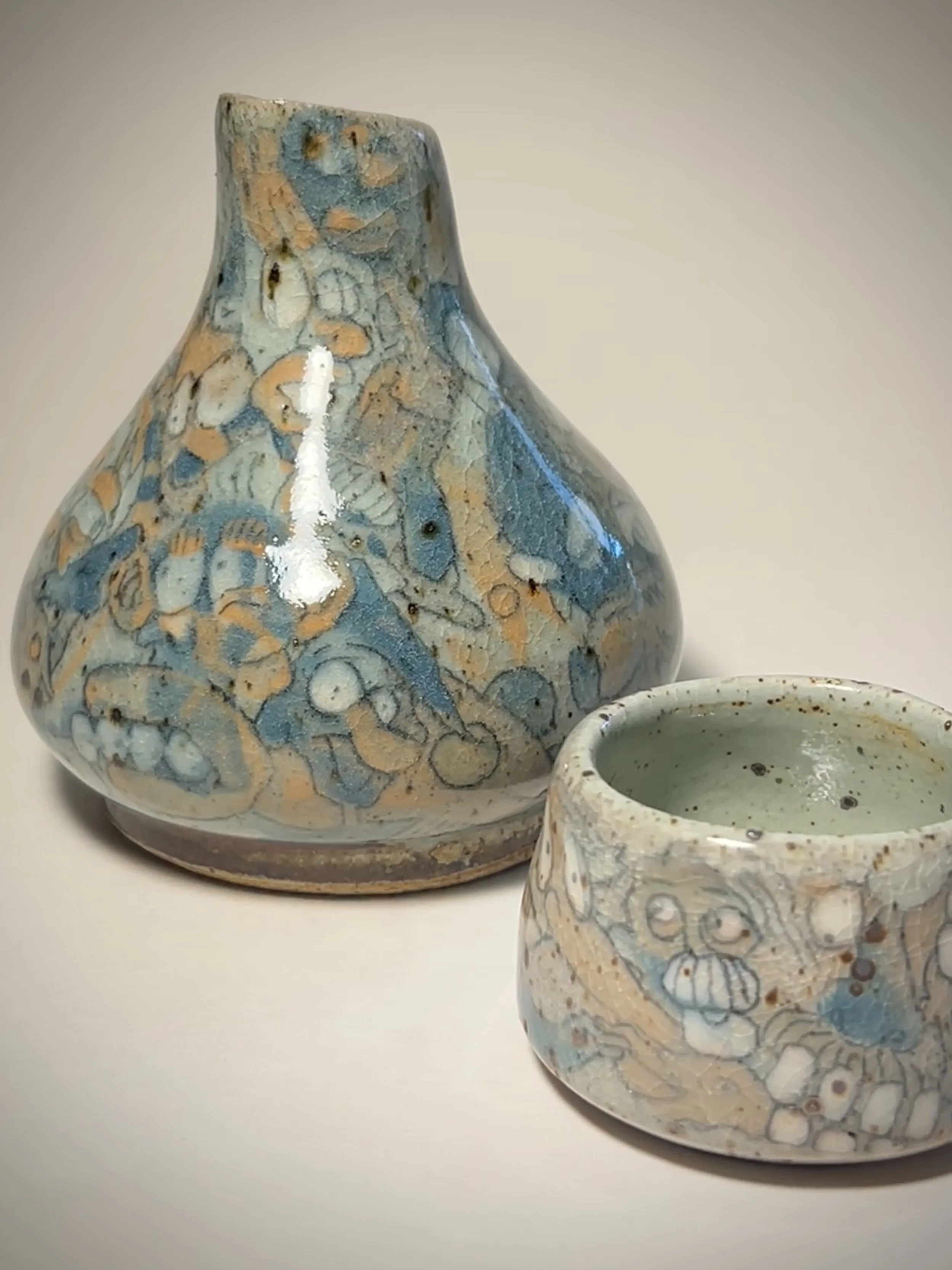 Close-up of blue, orange and white glaze details