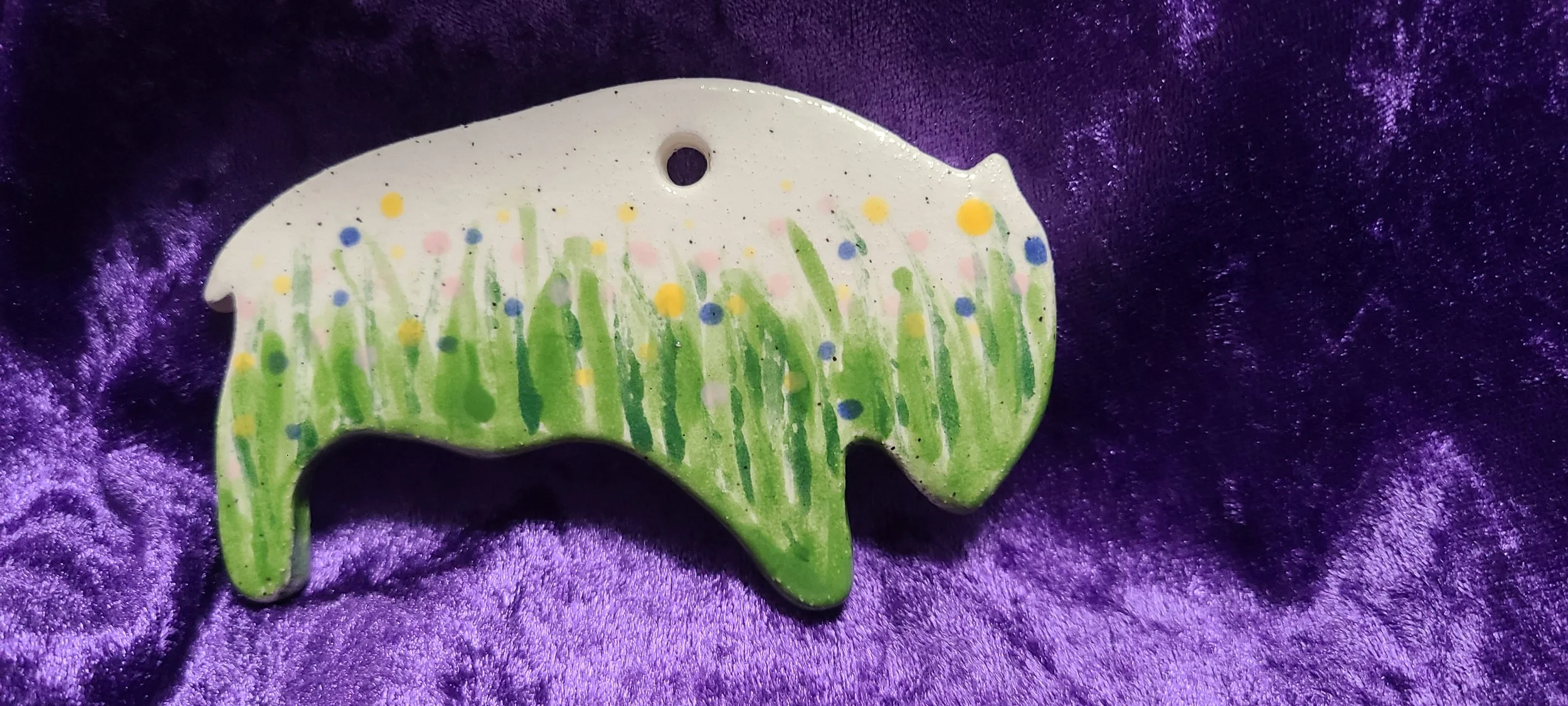 Ceramic buffalo ornament with floral motif