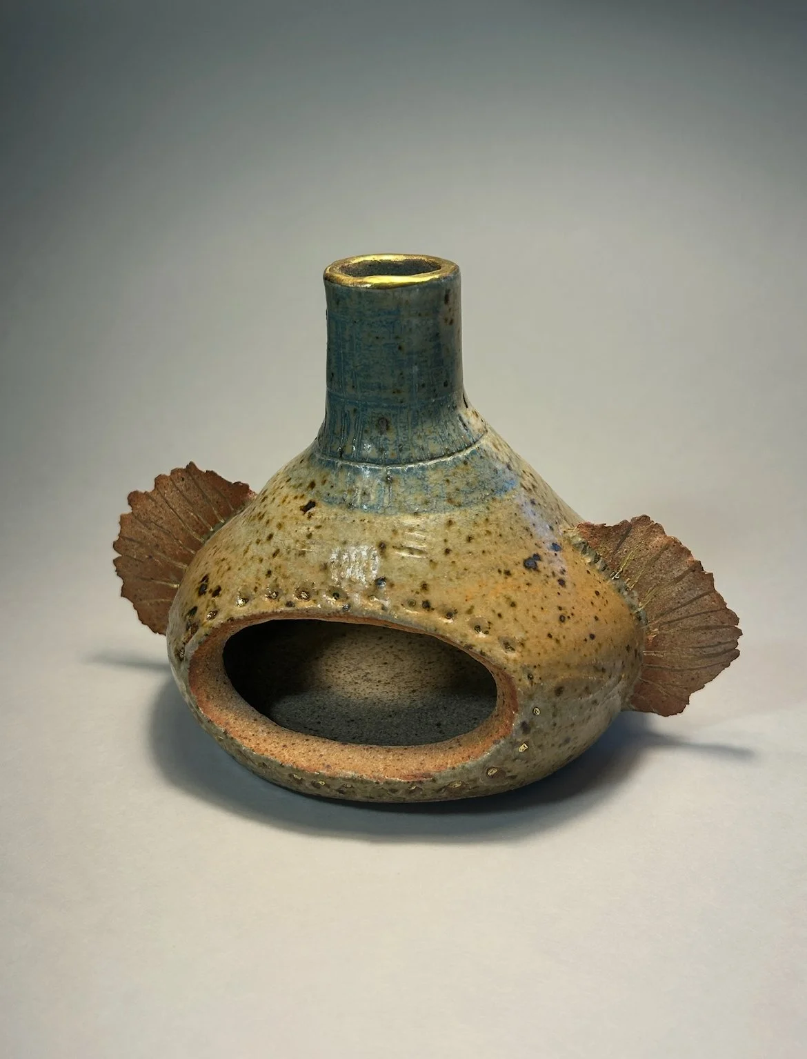 Mini ceramic burner with fins