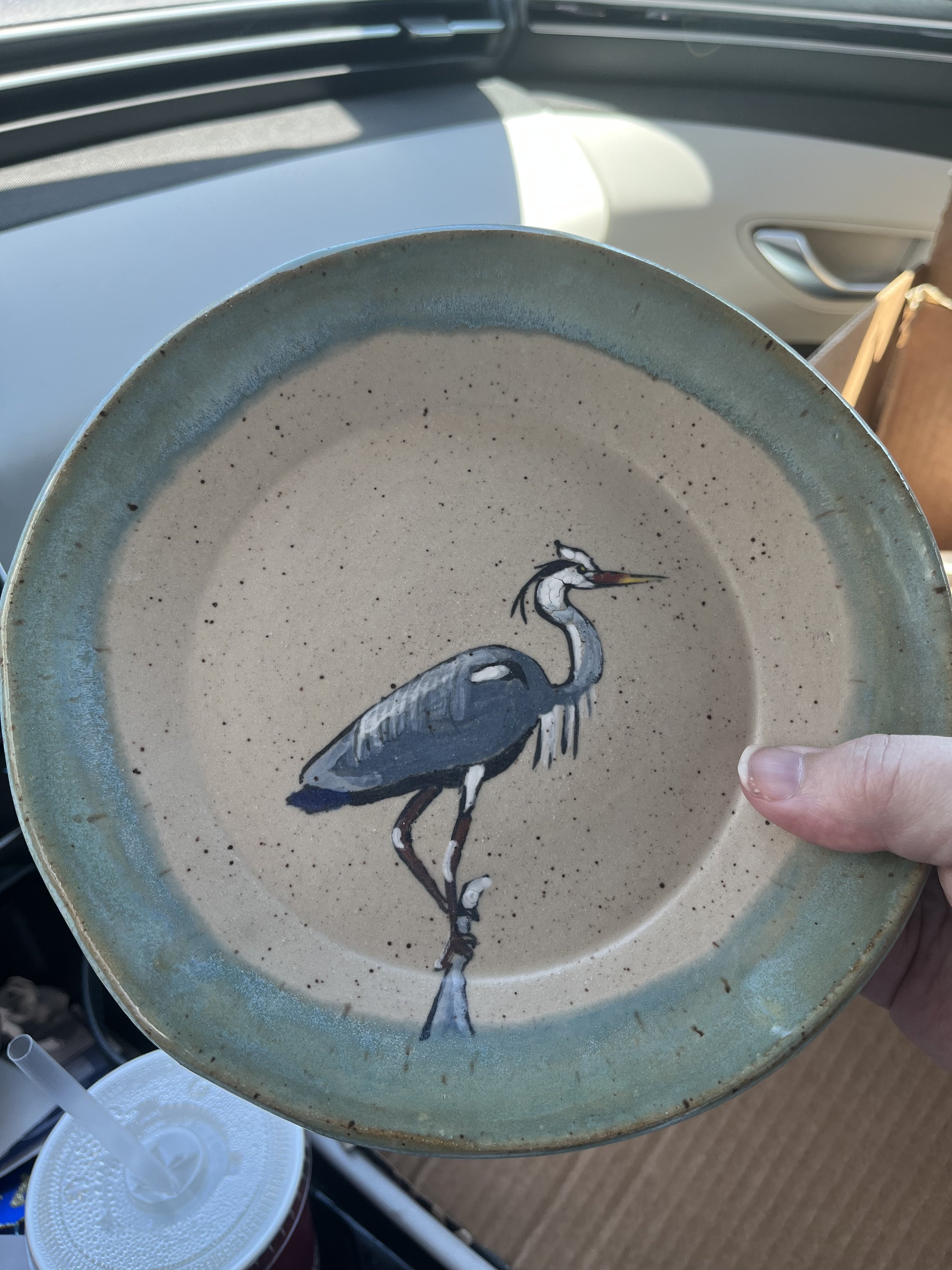 Ceramic plate with delicate bird