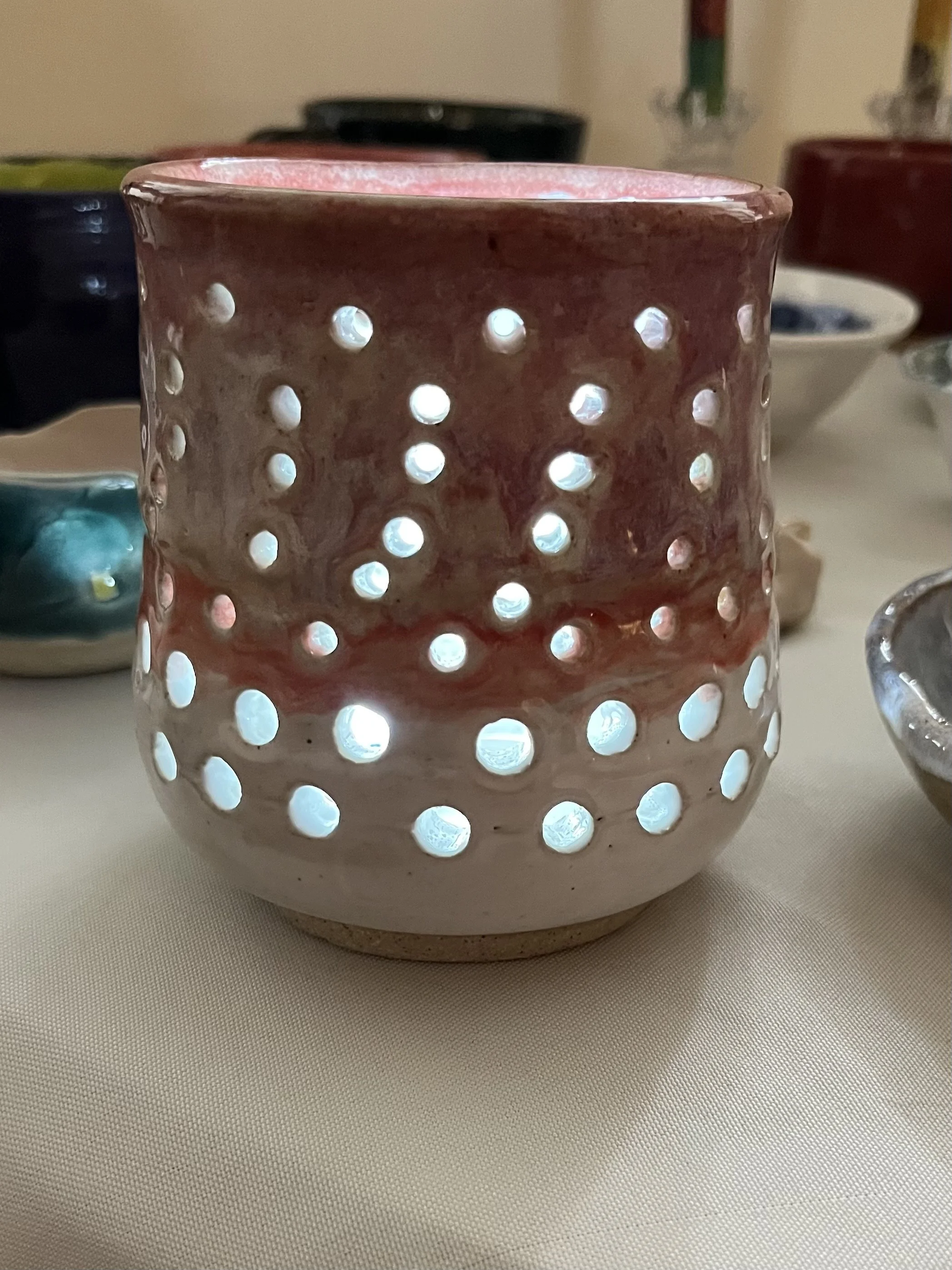 Ceramic luminary. vase in red and white