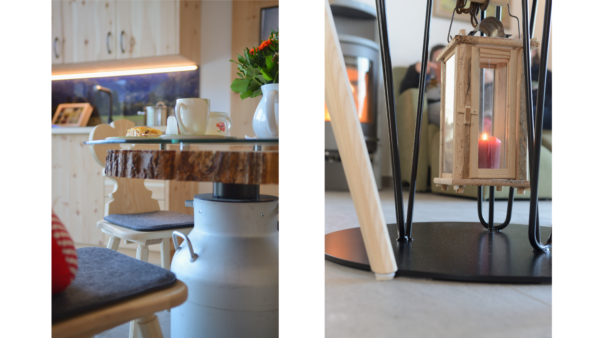 Innenaufnahme eines Esszimmers mit Holztisch, Stühlen und einer Vase mit Blumen. Im Hintergrund ein Holzofen. Ein Kerzenleuchter mit Glas und Kerze ist auf einem schwarzen Tisch im Vordergrund sichtbar.