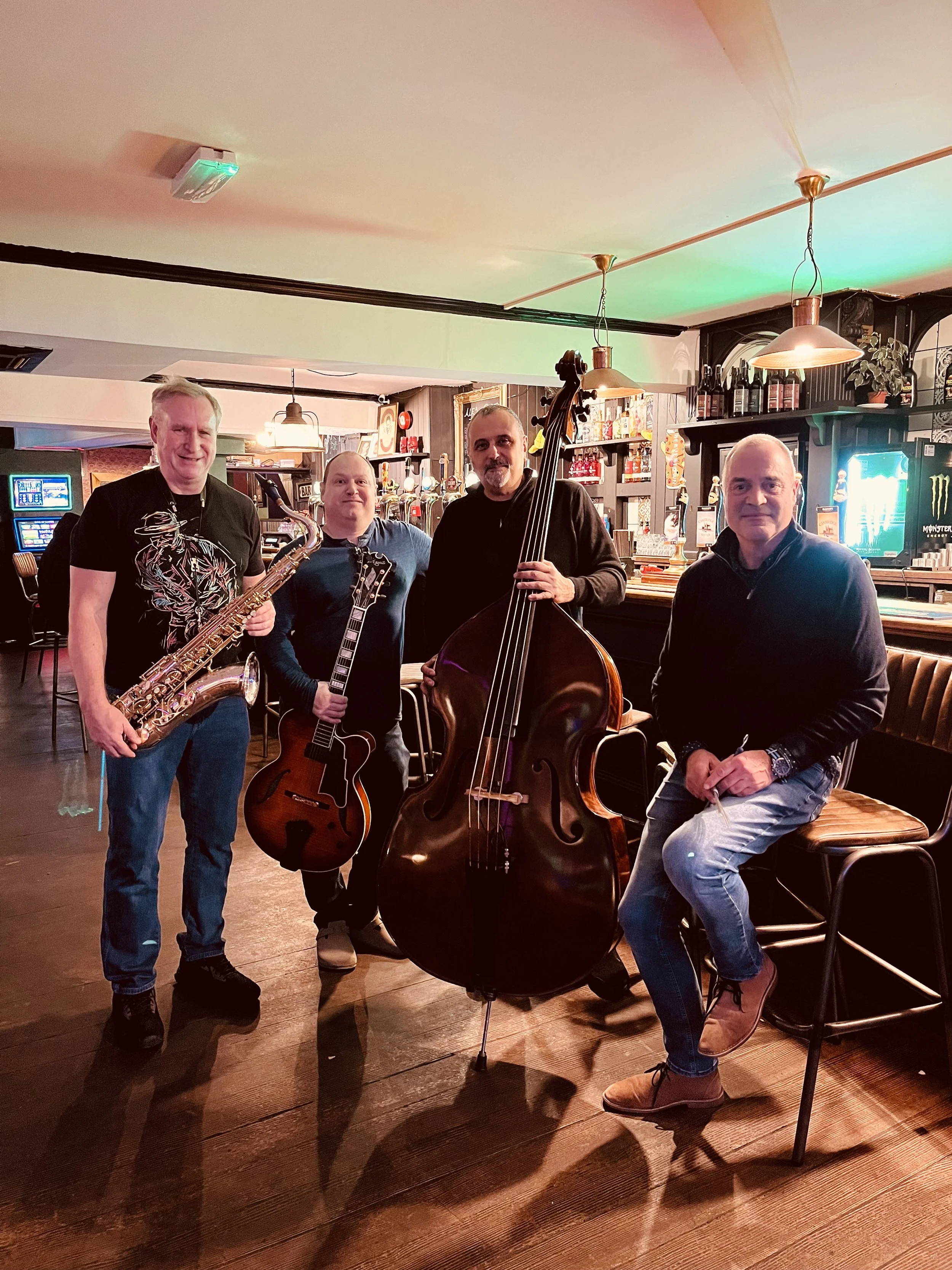 Triaura Norwich based Jazz quartet featuring guitar double bass, drums and sax Live in Norwich Norfolk twice a month and available for hire