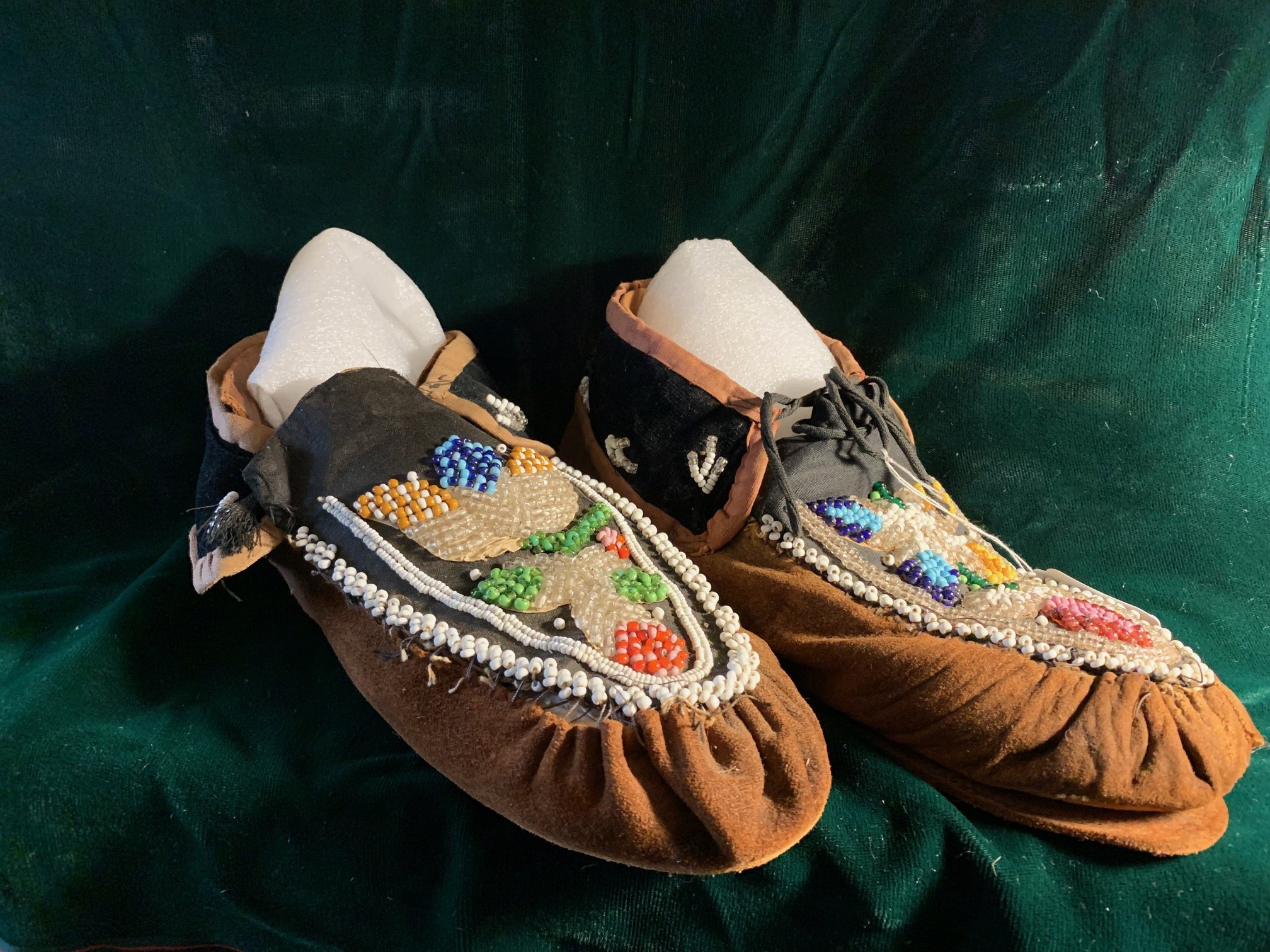 Pair of Indigenous embroidered moccasins.