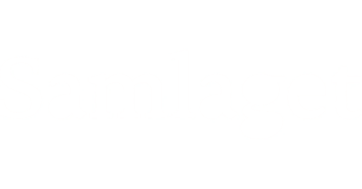 Bildet viser en typisk universitetscampus med flere høye bygninger, mennesker som går rundt, trær og grøntområder.