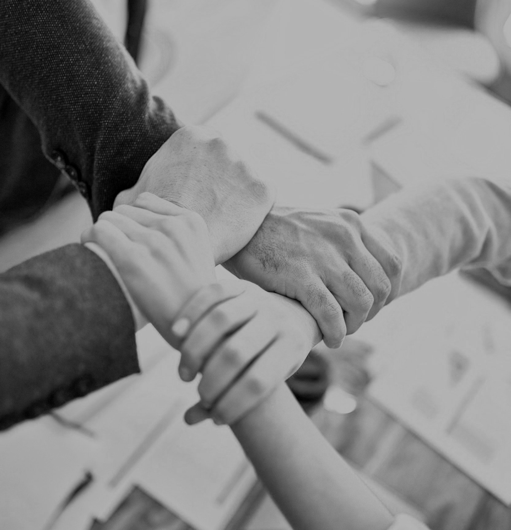 Geometric drawing of an outline square with sections divided by vertical, horizontal, and diagonal lines.