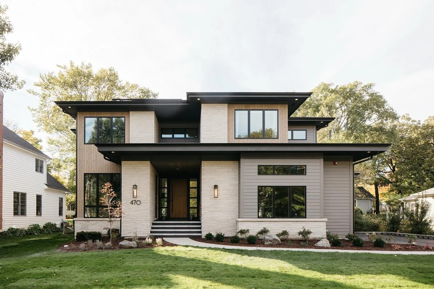Sleek. Modern. Timeless.
This stunning contemporary residence blends clean architectural lines with warm natural finishes, creating the perfect balance of elegance and comfort. Expansive windows invite in natural light, while the open design sets the