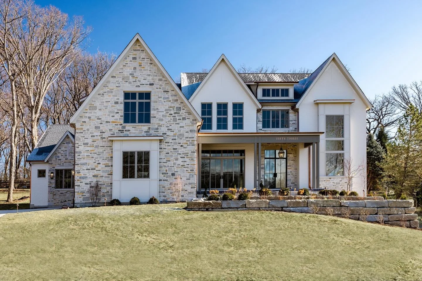 The perfect combo: stone, painted brick, and copper accents that shine!
.
.
.
Design/build: @mhousedevelopment 
Photography: @blossomlaneinteriorphoto 
.
.
.
#TraditionalHome #HomeExteriors #ExteriorDesign #TimelessDesign #CurbAppeal #ArchitecturalDe