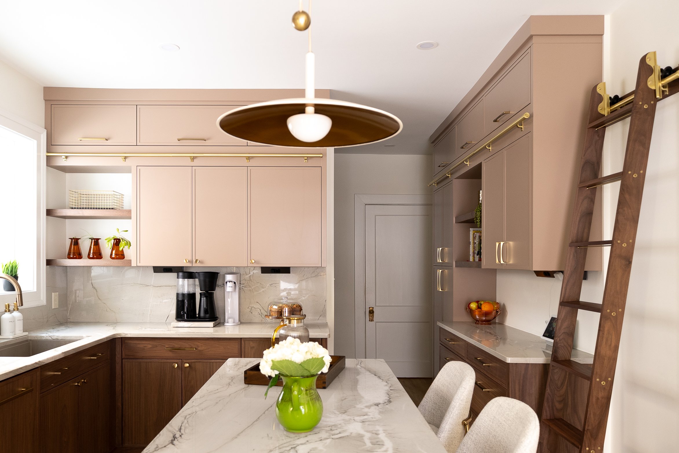 Schenley Farms Residence - This new island serves a multitude of purposes for the family. Food prep, breakfast, homework, crafting and much more. Photo by KH Home Photos