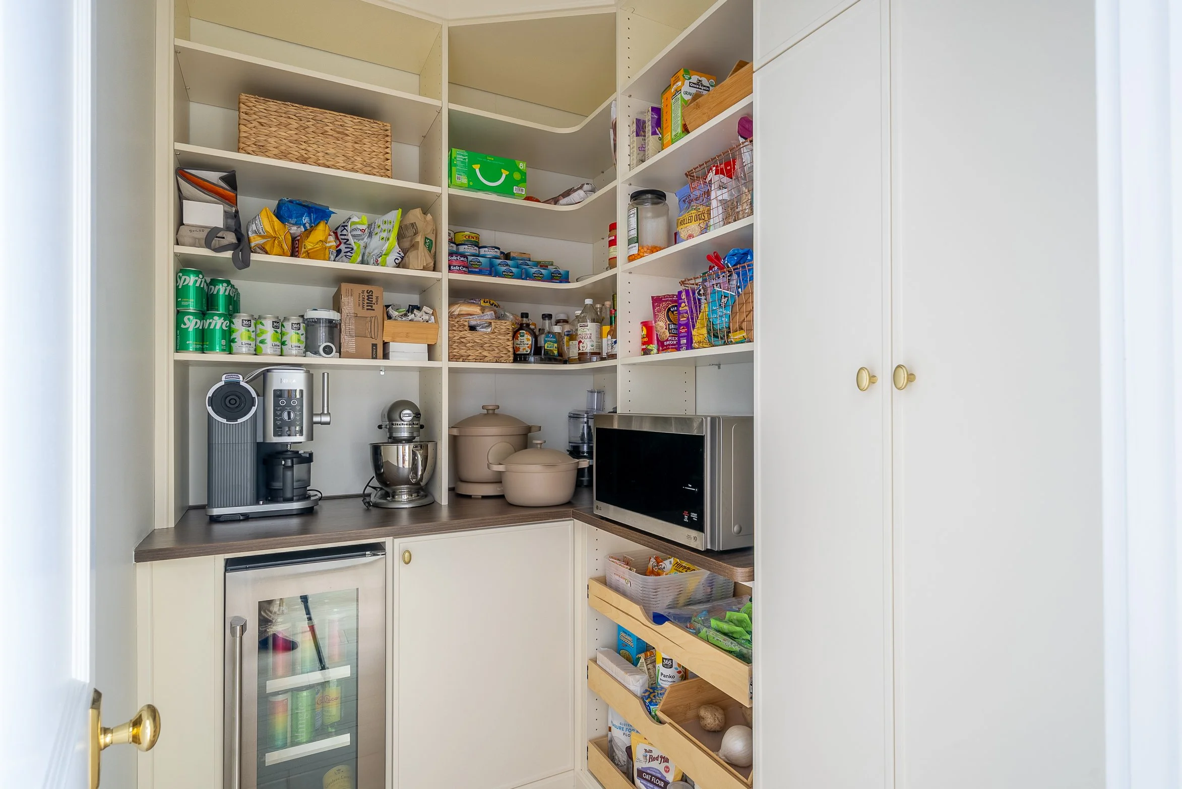 Schenley Farms Residence - A well organized pantry is essential for busy families.  We partnered with Inspired Closets Pittsburgh to deliver on that organization. Photo by KH Home Photos