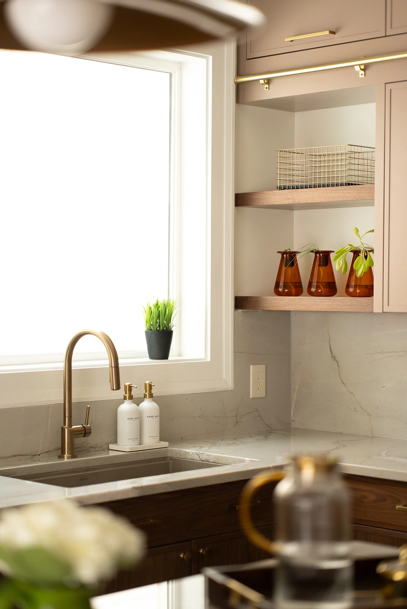 Schenley Farms Residence - Taking advantage of the natural light this window receives for growing fresh herbs. Photo by KH Home Photos