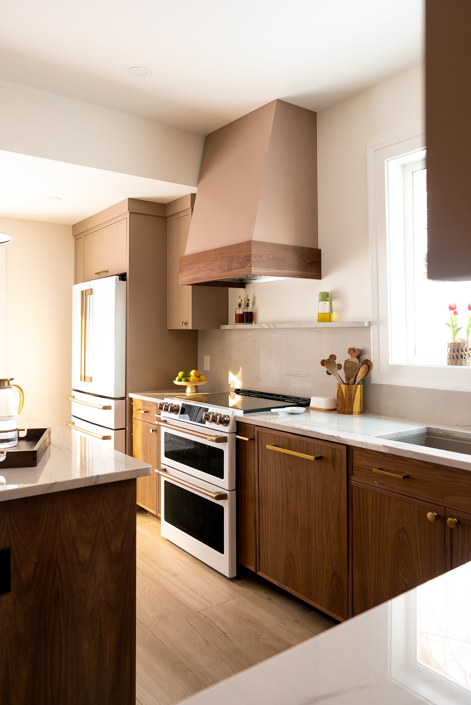 Schenley Farms Residence - Our friends at Don's Appliance provided thebeautiful Cafe appliances and panel front dishwasher. Photo by KH Home Photos