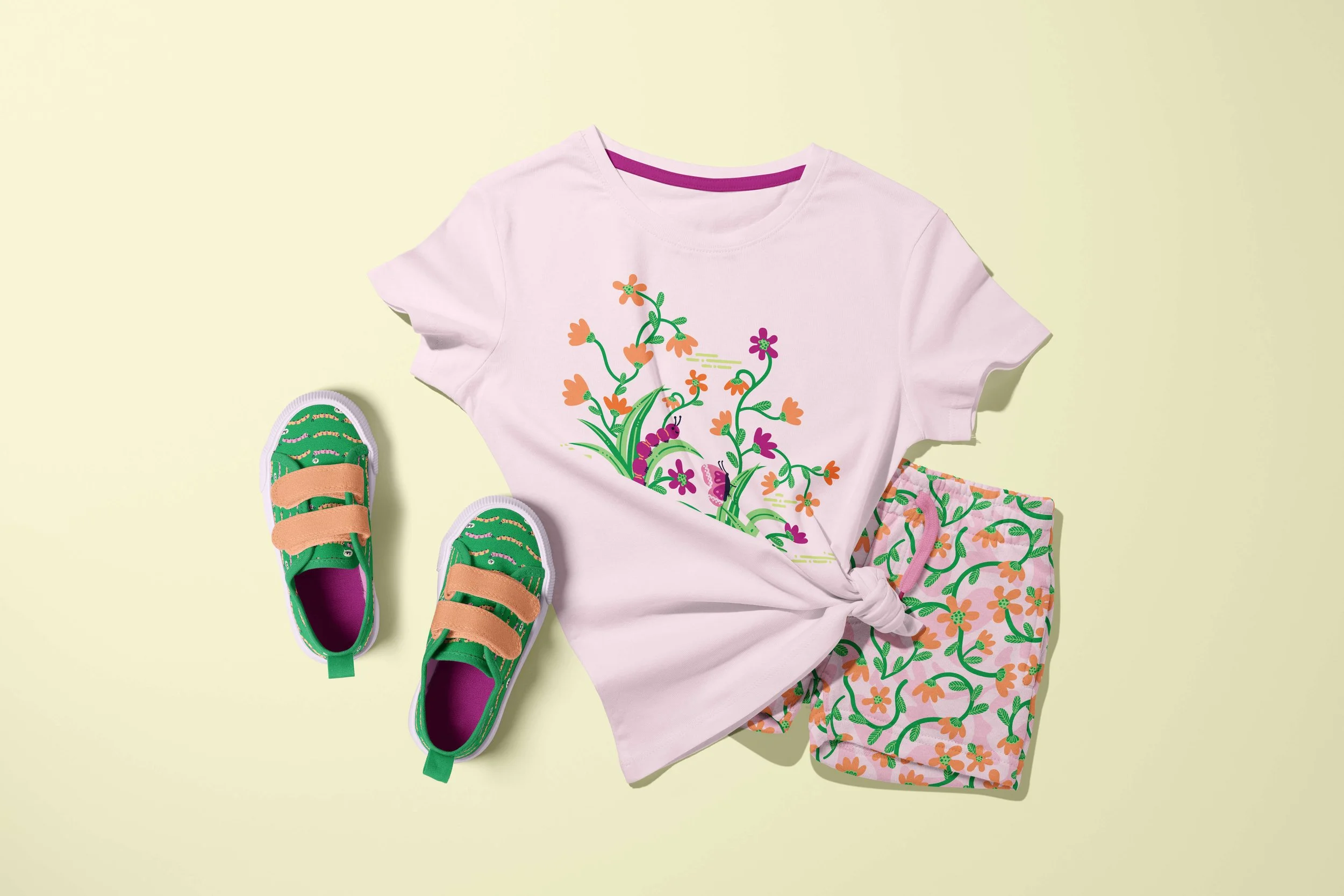 Shorts, T-shirt, and sneakers featuring multiple patterns from the Wiggle and Bloom collection in Sunblush colorway.