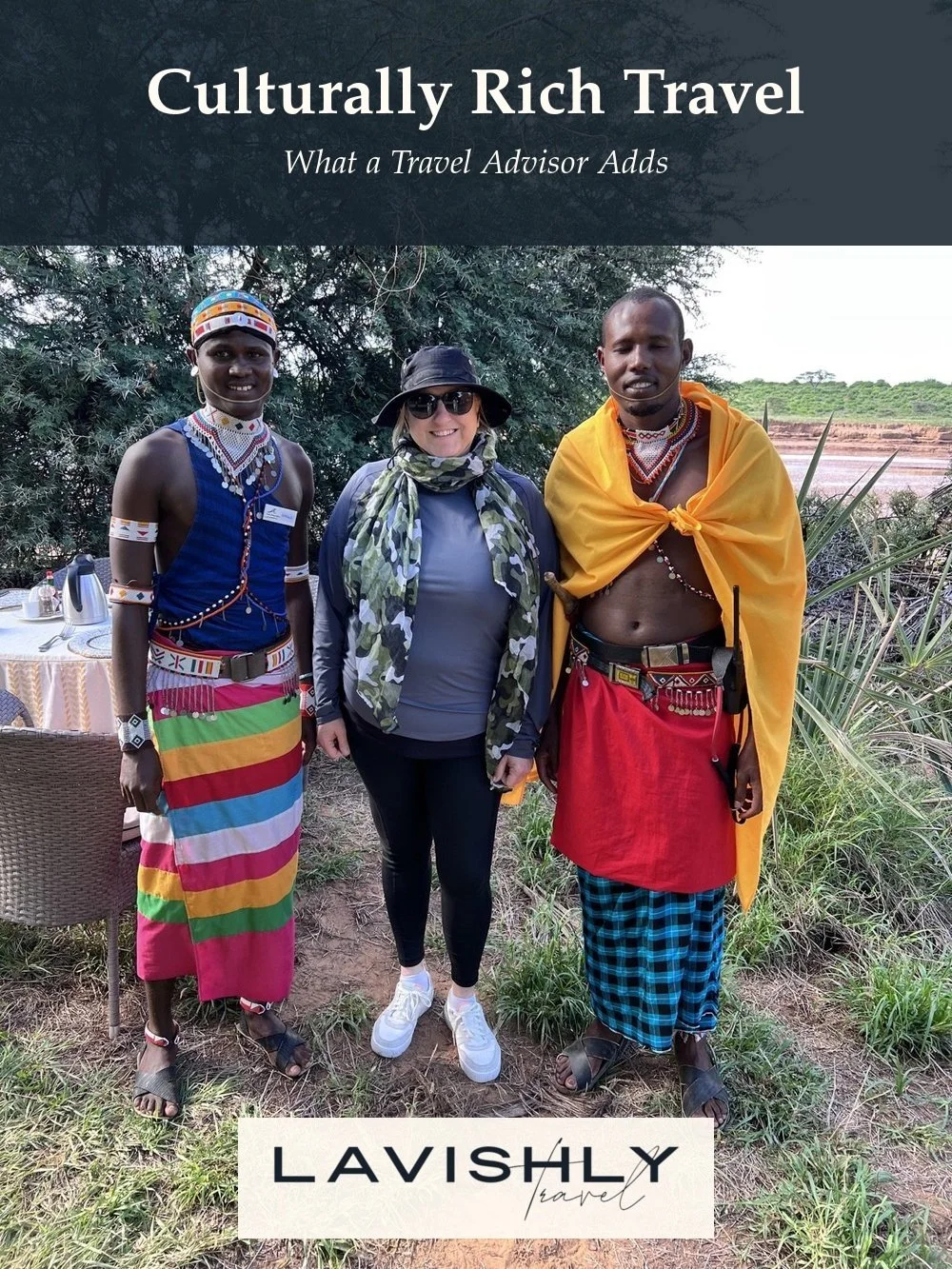 Jeanine Cioffi with two community members in Kenya. Overlay text reads “Culturally Rich Travel: What a Travel Advisor Adds,” with the Lavishly Travel logo.