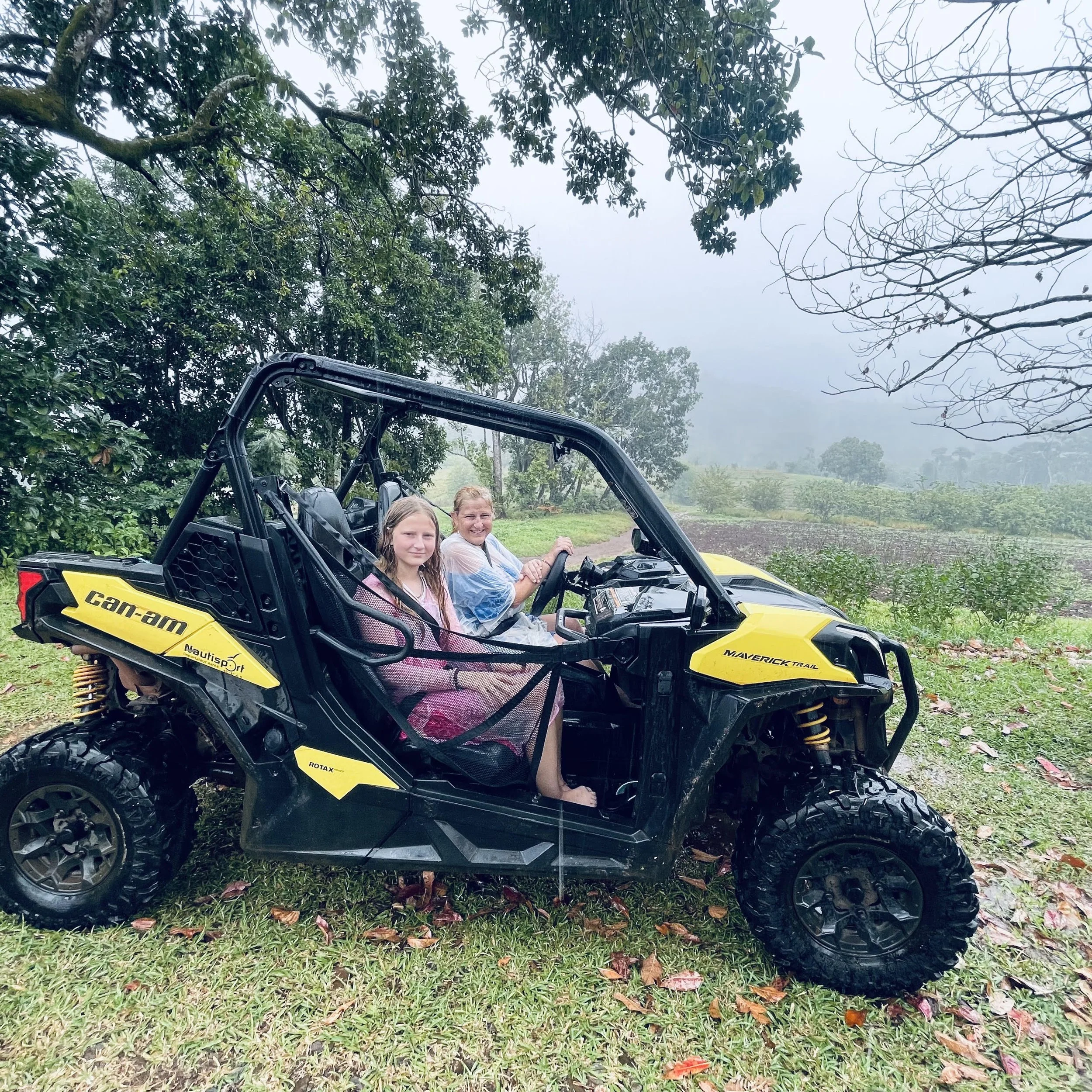 Jeanine with Lavishly Travel Mother Daughter Around the World Trip ATV in Rain French Polynesia