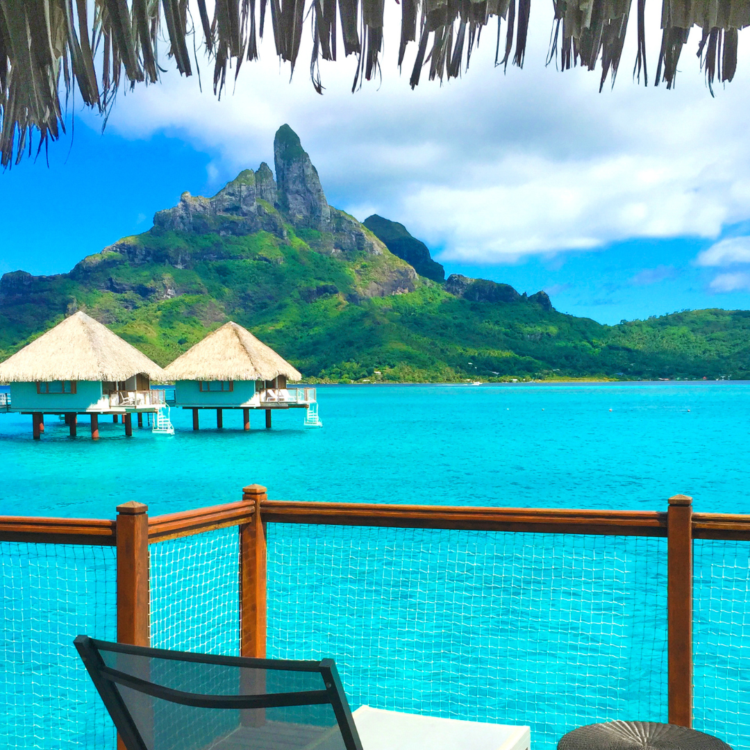 Overwater bungalows facing Mount Otemanu in Bora Bora
